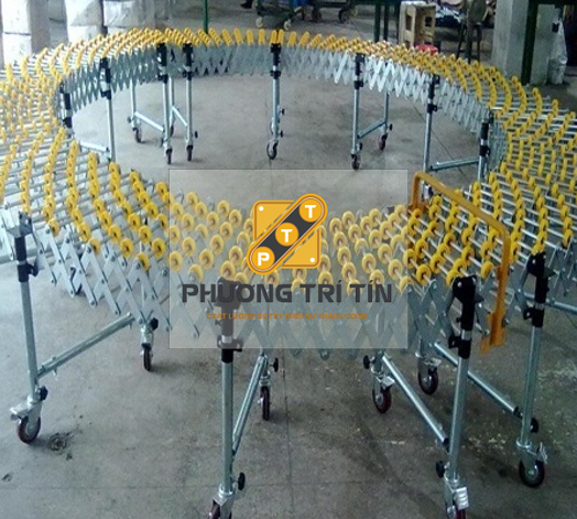 băng tải con lăn cong